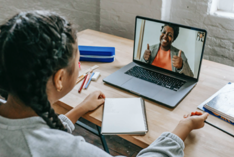 Two people chatting through zoom meeting.