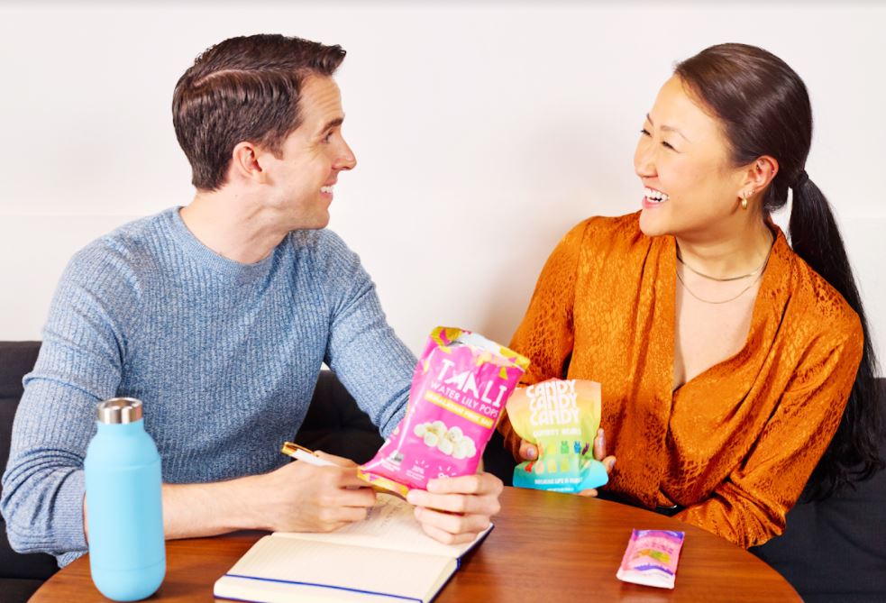 people happy eating snacks