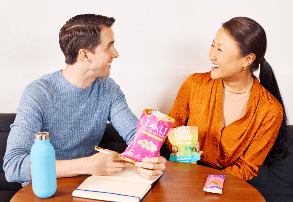 A couple enjoying snacks together