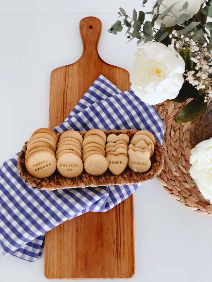 A rack of cooling cookies with customized messages baked into the cookie.