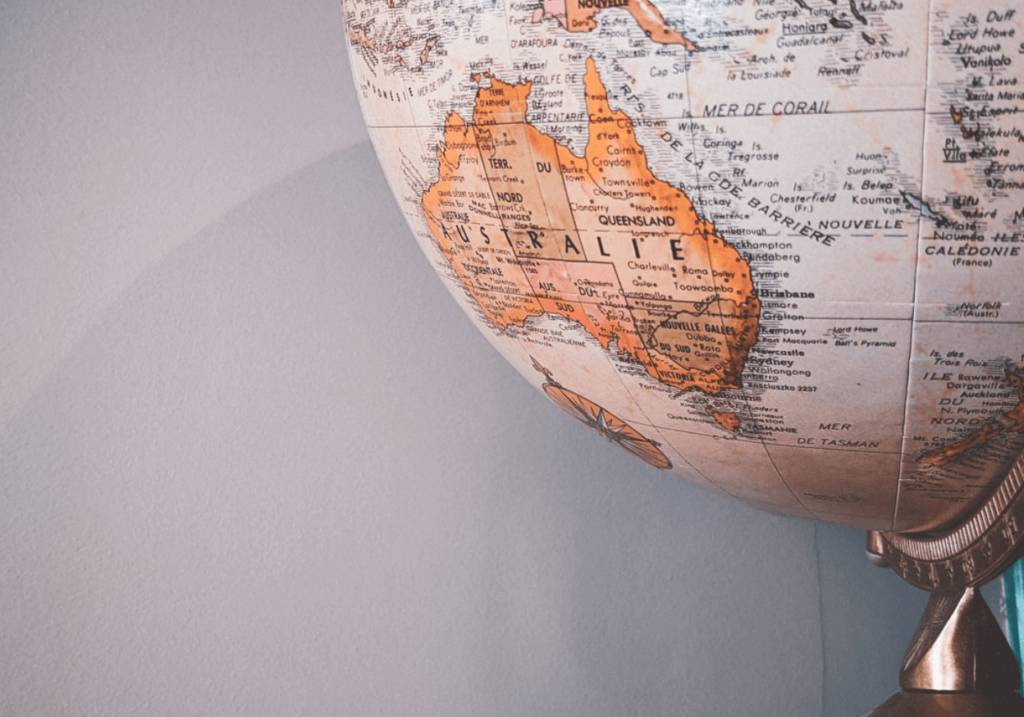 An ornate globe showing Australia and surrounding countries.