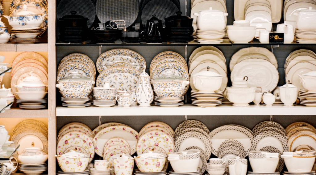 A huge selection of fine china in a storefront.